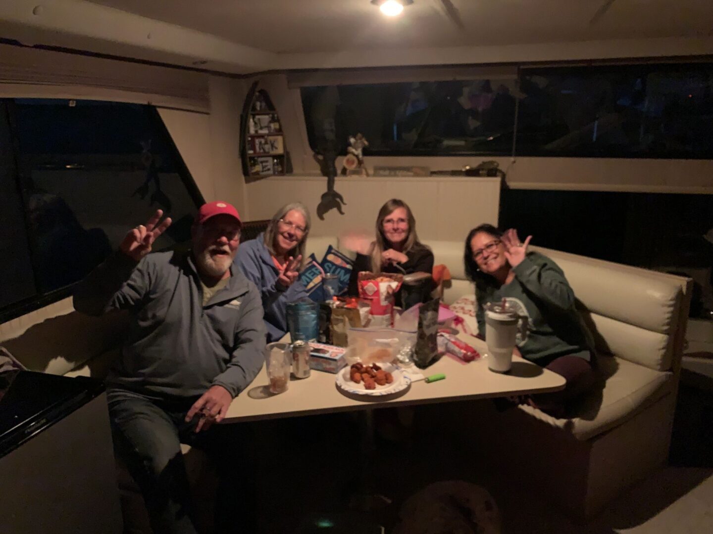 A group of people sitting around a table.