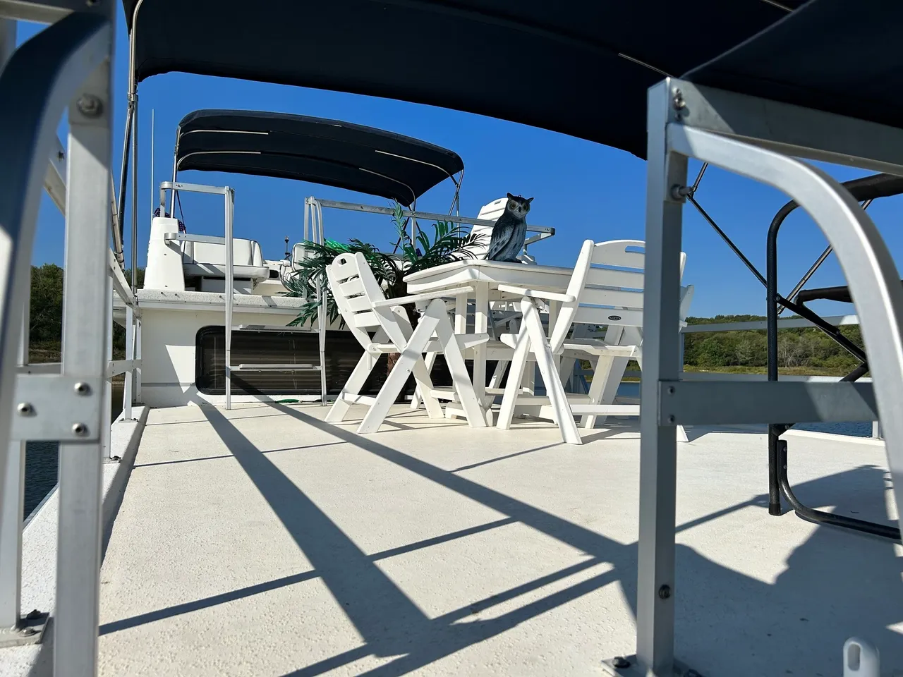 A boat with chairs and tables on it.